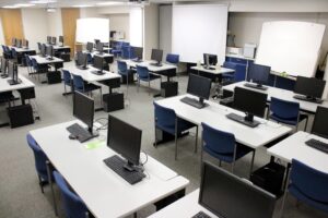 large classroom with computers at every desk